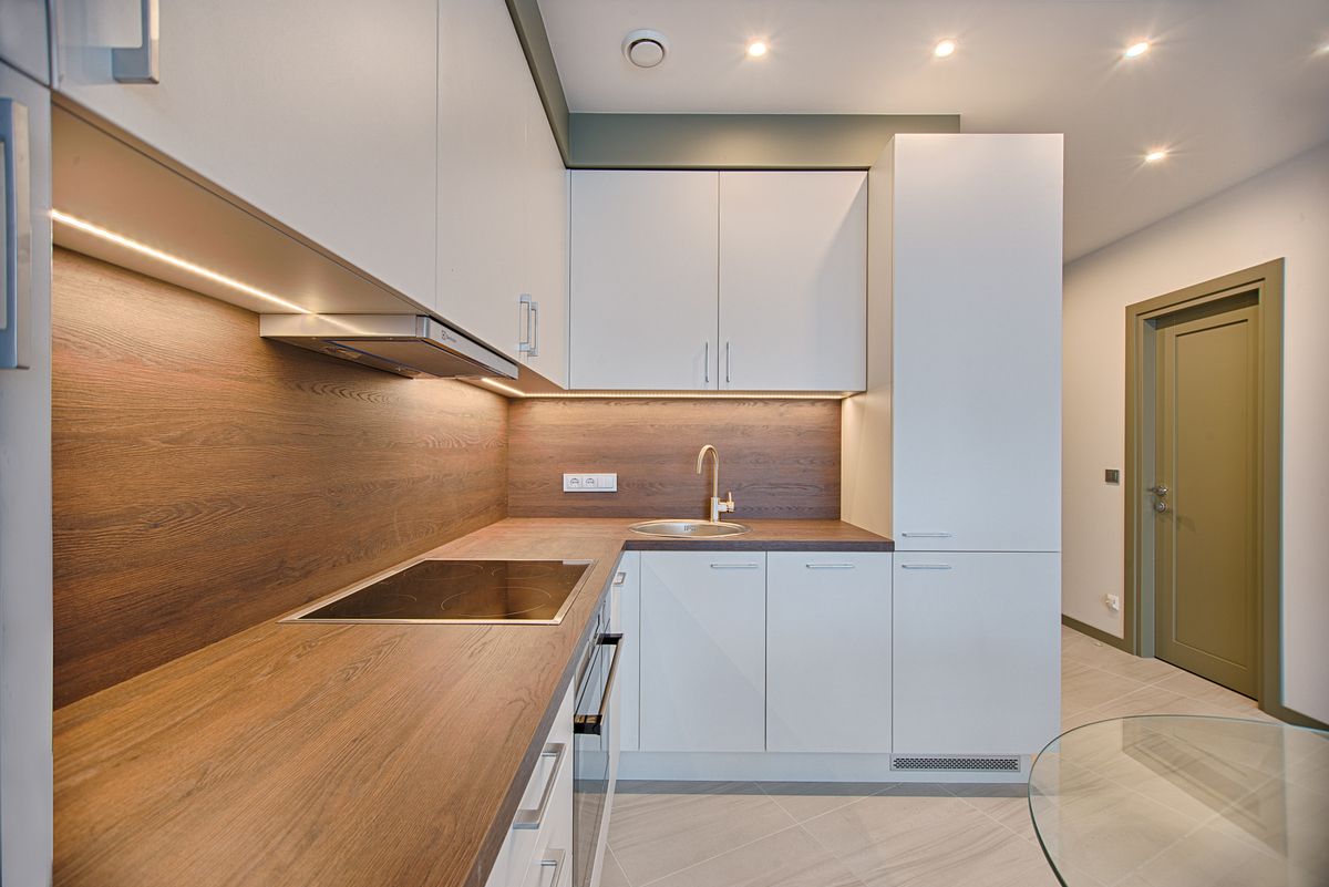 Professional real estate photographer shooting staged home interior for sale listing